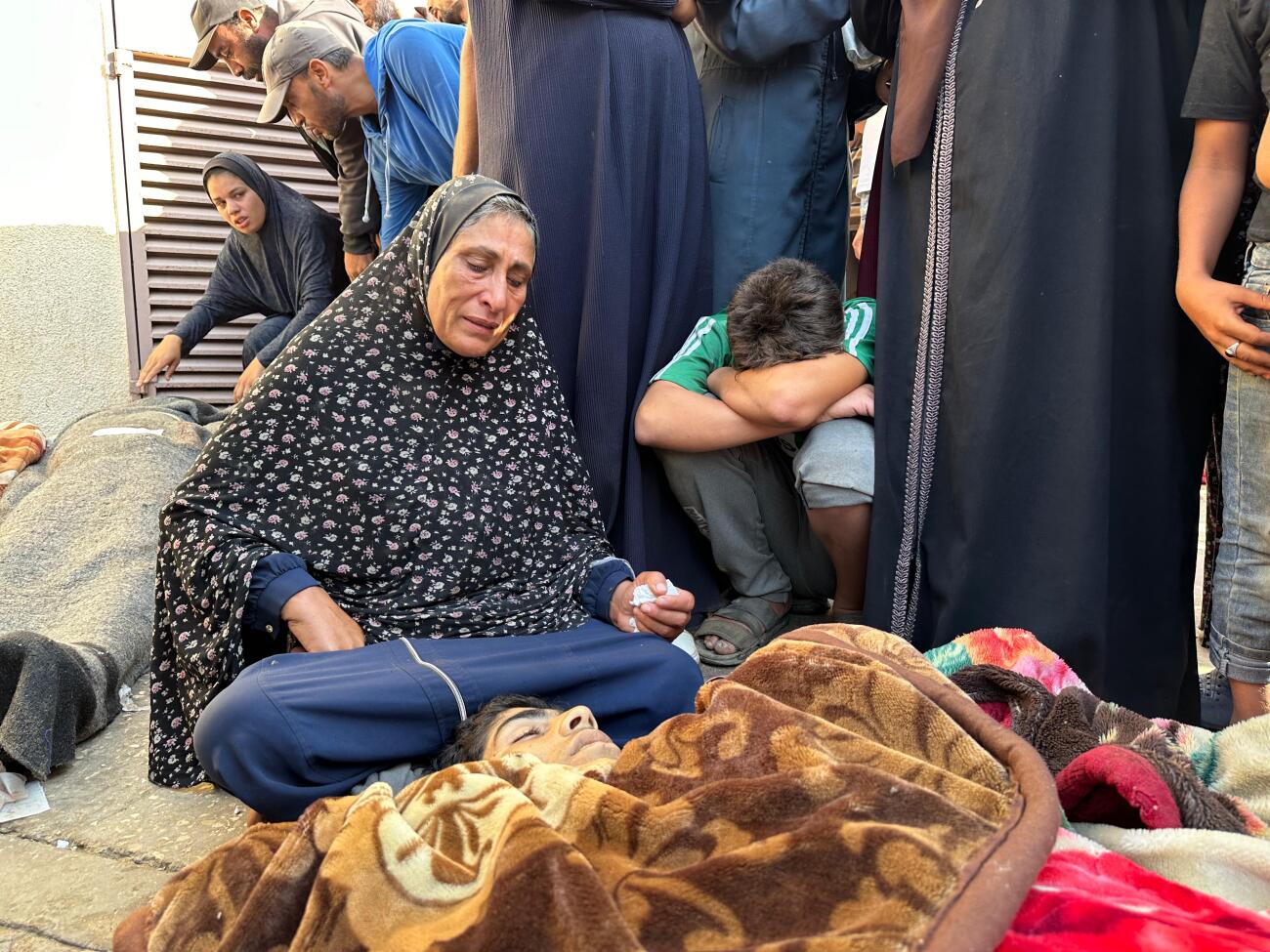 Relatives mourn family members killed in the airstrike.