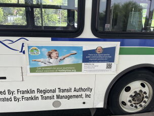 The independent health website Valley Vax is advertised on the sides of buses in Western Massachusetts.