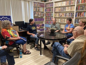 In this undated photo from the campaign, independent congressional candidate Sarah Zabel campaigns with community members in Grangeville, Idaho.
