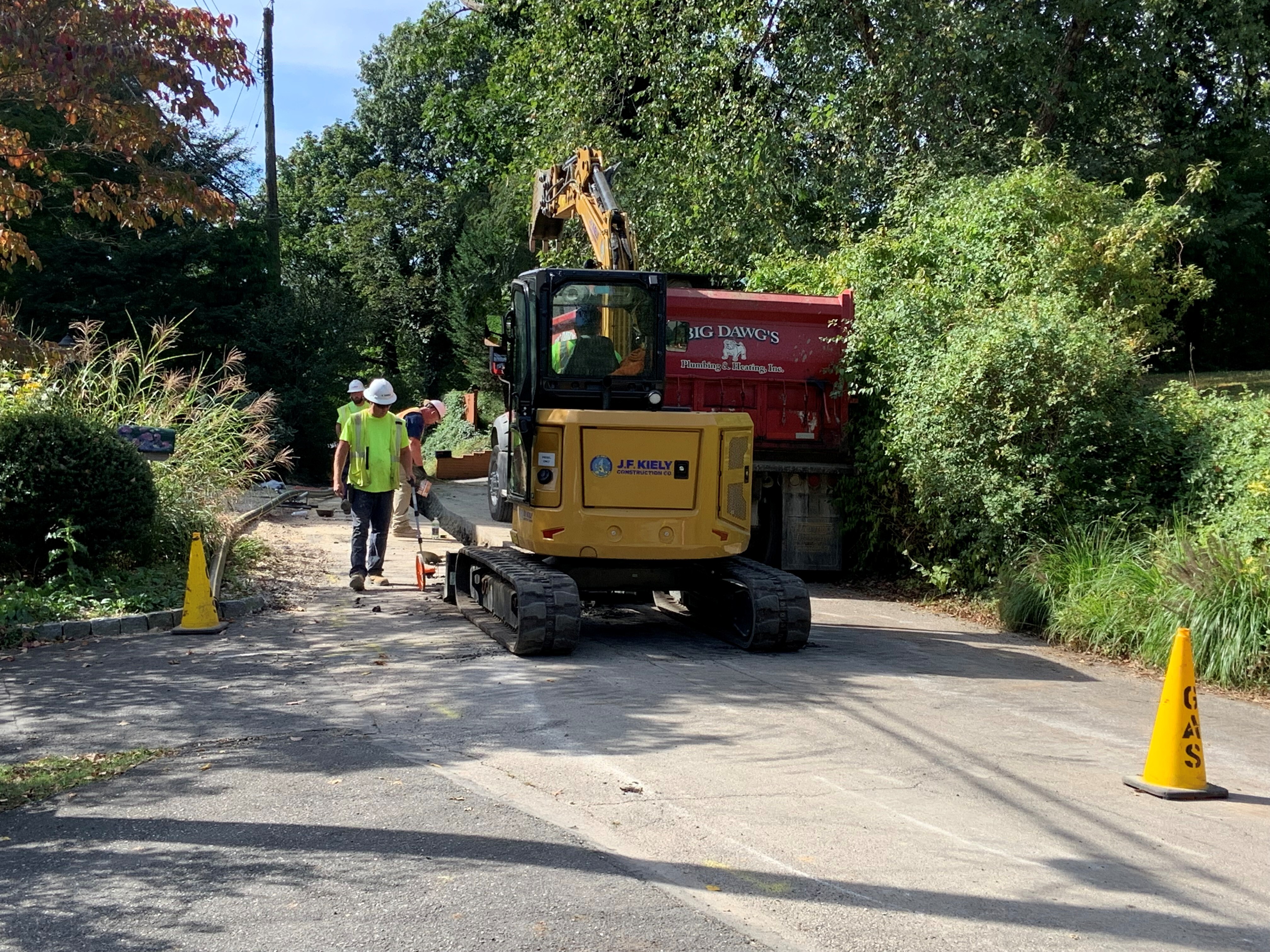 A gas pipeline construction crew in Wyncote, Pa., replaces older pipes that are prone to leaking climate-heating methane. Projects like this are increasing gas customers' bills, even as wholesale gas prices are relatively low. (NPR)