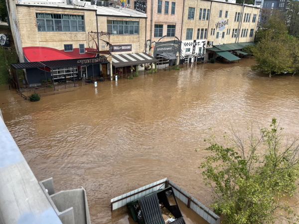 The River Arts District in Asheville, N.C., during the flooding from Tropical Storm Helene in 2024. The French Broad River crested high enough to breach the first floor of the buildings.