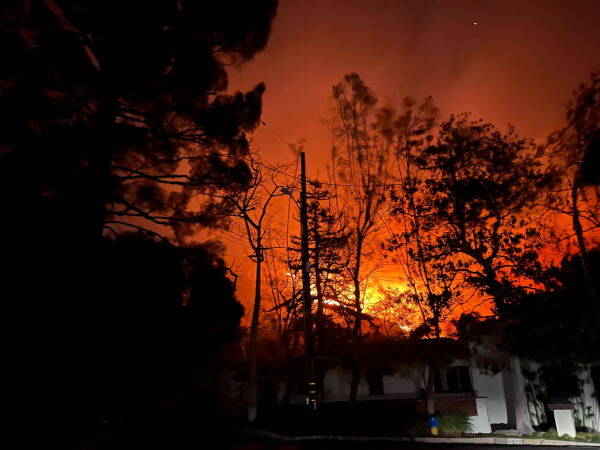 The Palisades Fire is seen in Altadena.