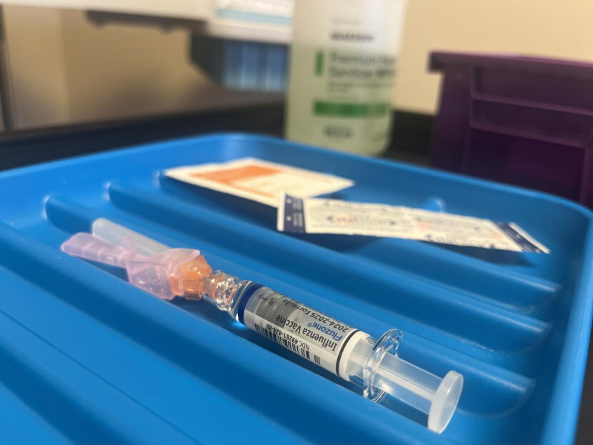An influenza vaccine and supplies at Anchorage Health Department's clinic on Feb. 25, 2025.