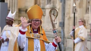 Sarah Mullally waves as she leaves after the Enthronement Ceremony installing her as archbishop of Canterbury in Canterbury, England, Wednesday, March 25, 2026. She is the first woman ever to lead the Church of England. 
