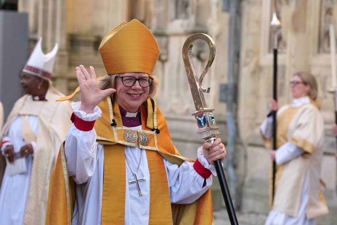 Sarah Mullally waves as she leaves after the Enthronement Ceremony installing her as archbishop of Canterbury in Canterbury, England, Wednesday, March 25, 2026. She is the first woman ever to lead the Church of England. 
