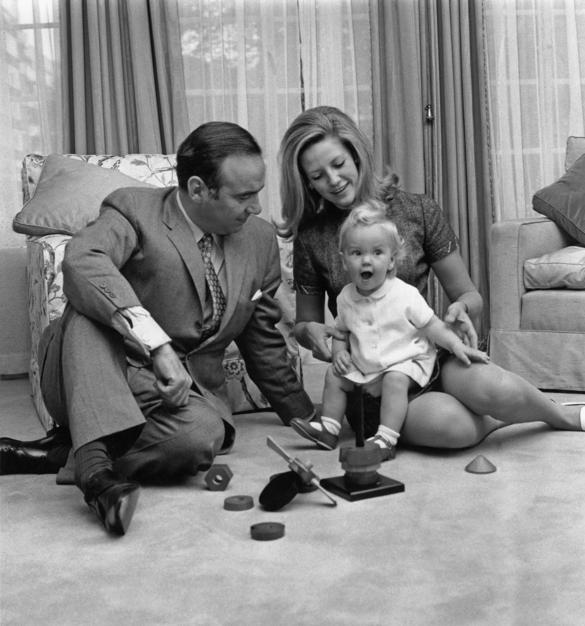 Rupert Murdoch with his then-wife Anna and their 14-month old daughter Elisabeth at their home in London in 1969.