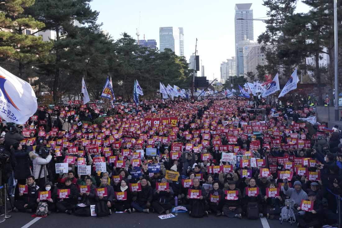 Protesters stage a rally demanding South Korean President Yoon Suk Yeol's impeachment, in front of the National Assembly in Seoul, South Korea, on Saturday.