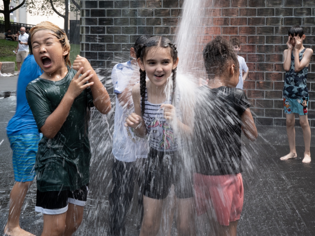 People cooled off at Crown Fountain in Millennium Park in Chicago, Illinois, as temperatures reached a record high of 97 degrees on Monday, June 17.