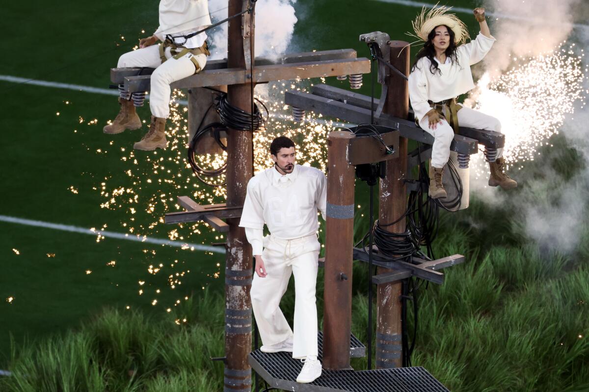 During his song 'El Apagón,' which means 'The Blackout,' Bad Bunny performed on replicas of electrical poles, in a pointed reference to the problems Puerto Rico's electrical grid has struggled with.