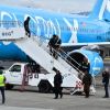 Migrants deported from the U.S. get off an airliner at the runway of the Juan Santamaria International Airport in Alajuela, Costa Rica in April 2026.