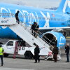 Migrants deported from the U.S. get off an airliner at the runway of the Juan Santamaria International Airport in Alajuela, Costa Rica in April 2026.