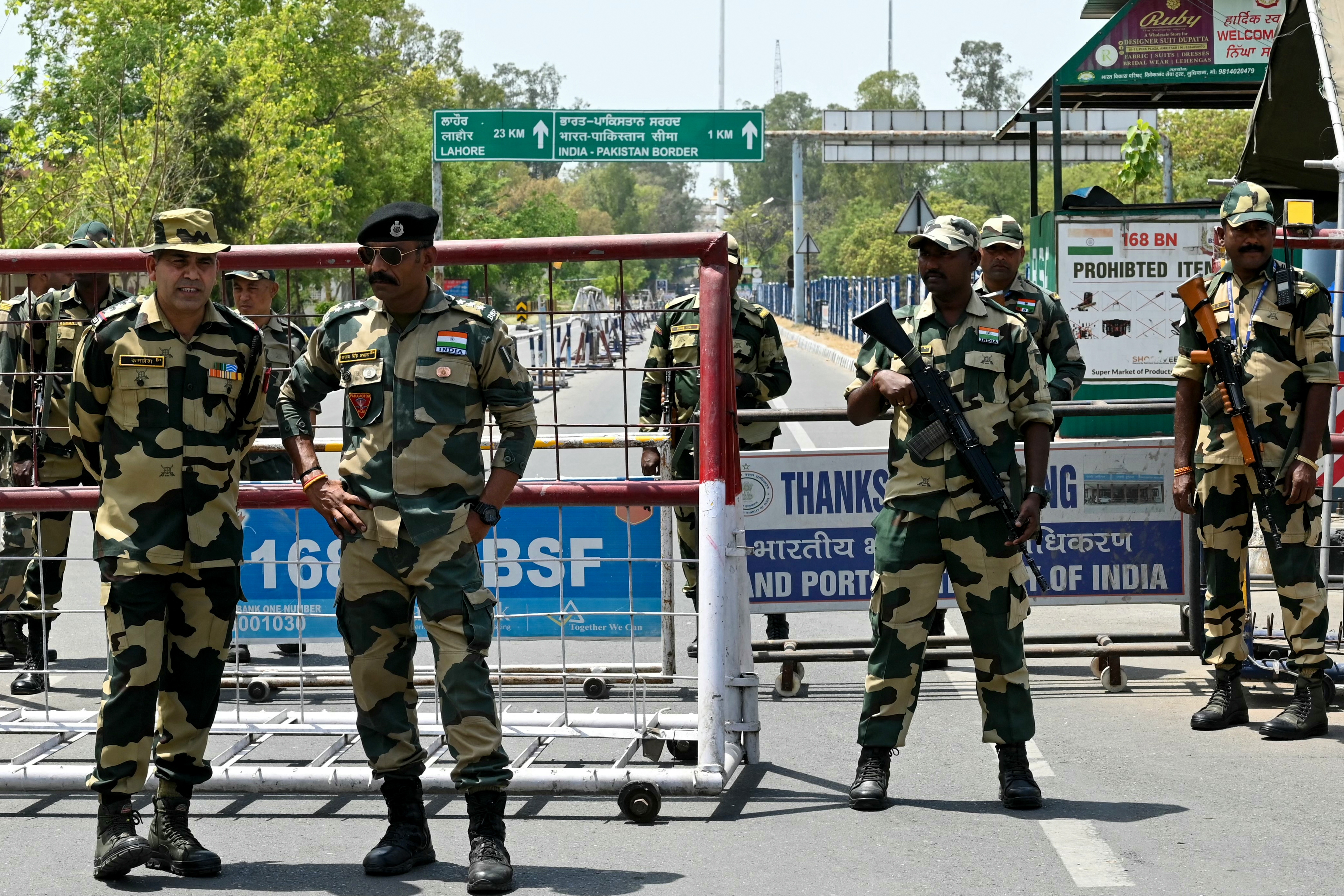 Indian Border Security Force (BSF) soldiers stand guard at the India-Pakistan Wagah border post on the outskirts of Amritsar on April 24. At least 26 people were killed April 22 in Indian-administered Kashmir when gunmen opened fire on tourists, in the region