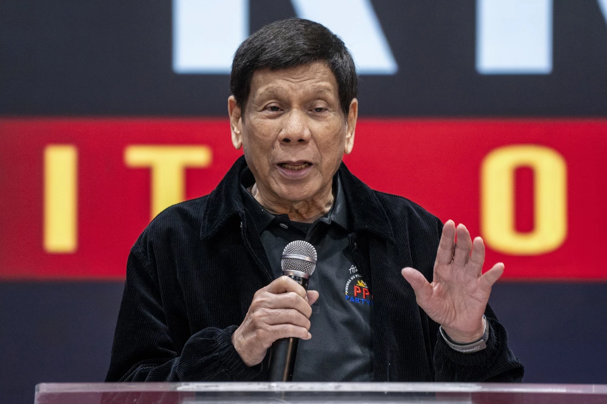 Former President of the Philippines Rodrigo Duterte speaks inside the Southorn Stadium during a thanksgiving gathering organized by Hong Kong-based Filipino workers for the former populist president in Hong Kong on March 9, 2025.