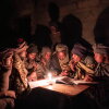 Shepherds attend a part time night school near Mokhotlong, Lesotho. For many, these classes, which occur roughly twice a month, are the only form of education they can access.