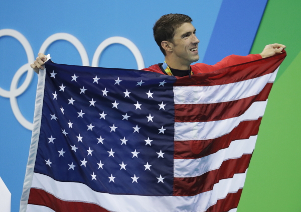 United States' Michael Phelps dominated swimming, tilting the global balance in favor of the U.S. He retired after the 2016 Summer Olympics in Rio de Janeiro, Brazil. (AP Photo/Julio Cortez)