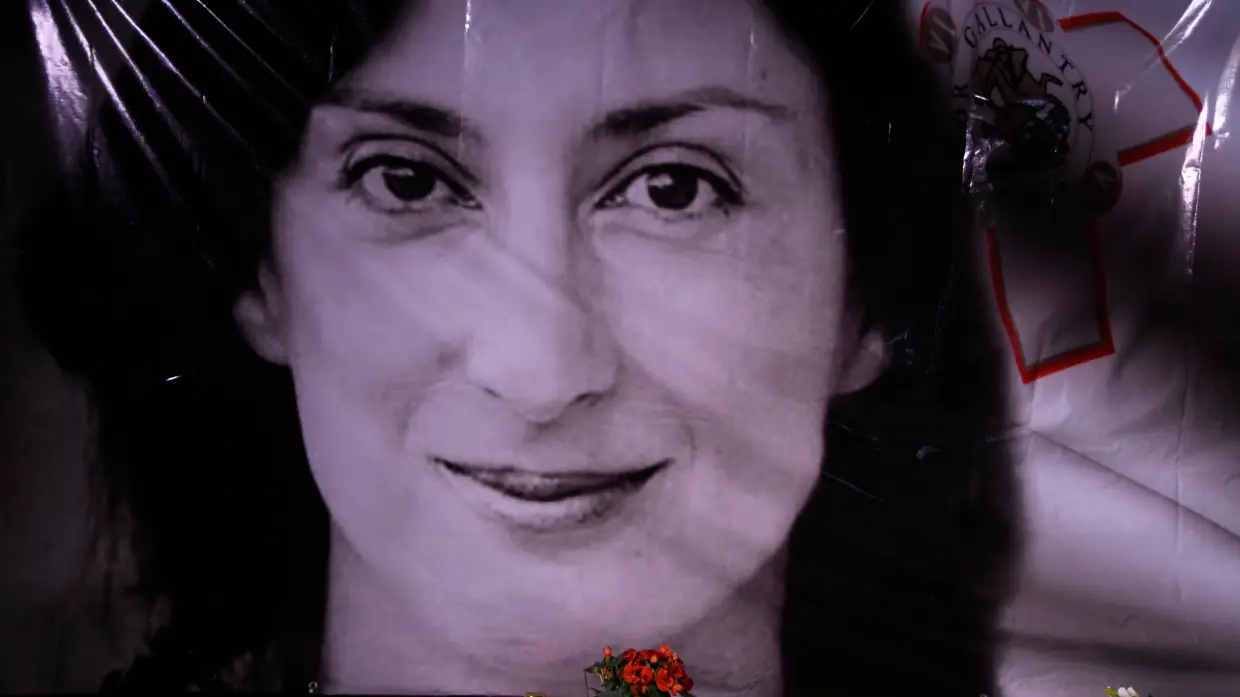 A jury in Malta acquits a businessman in the killing of reporter Daphne Caruana Galizia