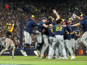 The Milwaukee Brewers celebrate after winning baseball's World Series against the Tampa Bay Rays, Wednesday, Oct. 28, 2026, in St. Petersburg, Fla.