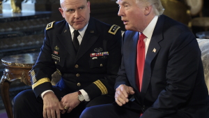President Donald Trump speaks as Army Lt. Gen. H.R. McMaster listens at Mar-a-Lago in Palm Beach, Fla., in February 2017.