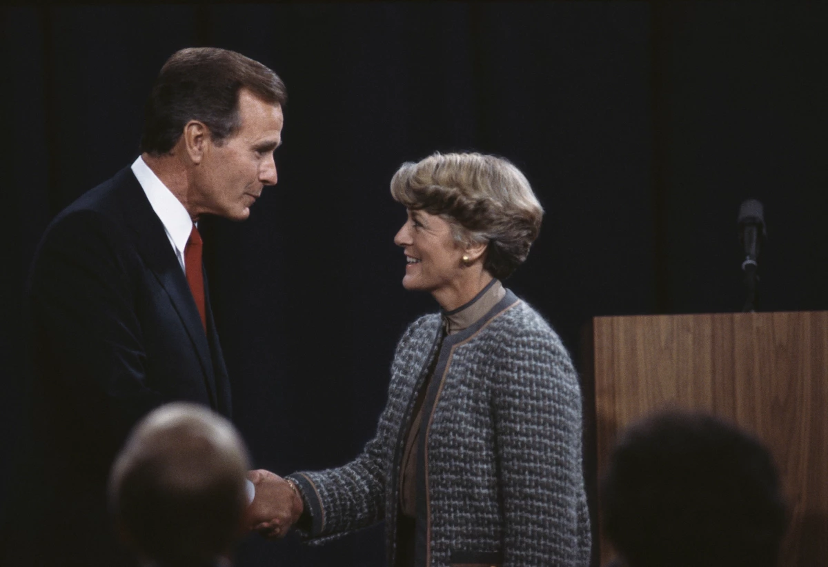 Vice President George Bush and New York congresswoman Geraldine Ferraro shake hands during a televised debate from Philadelphia.