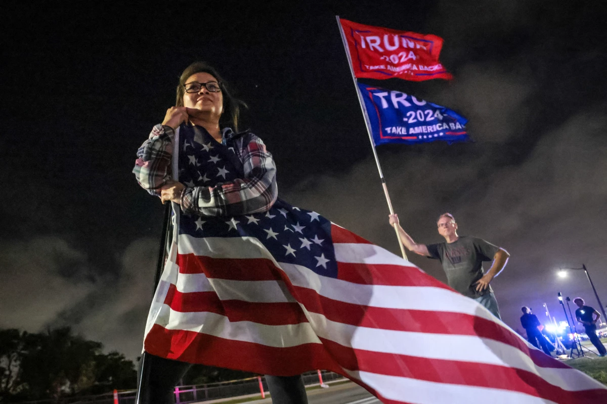 Supporters of Donald Trump gather near his Mar-a-Lago resort in Palm Beach, Florida, on Election Day.