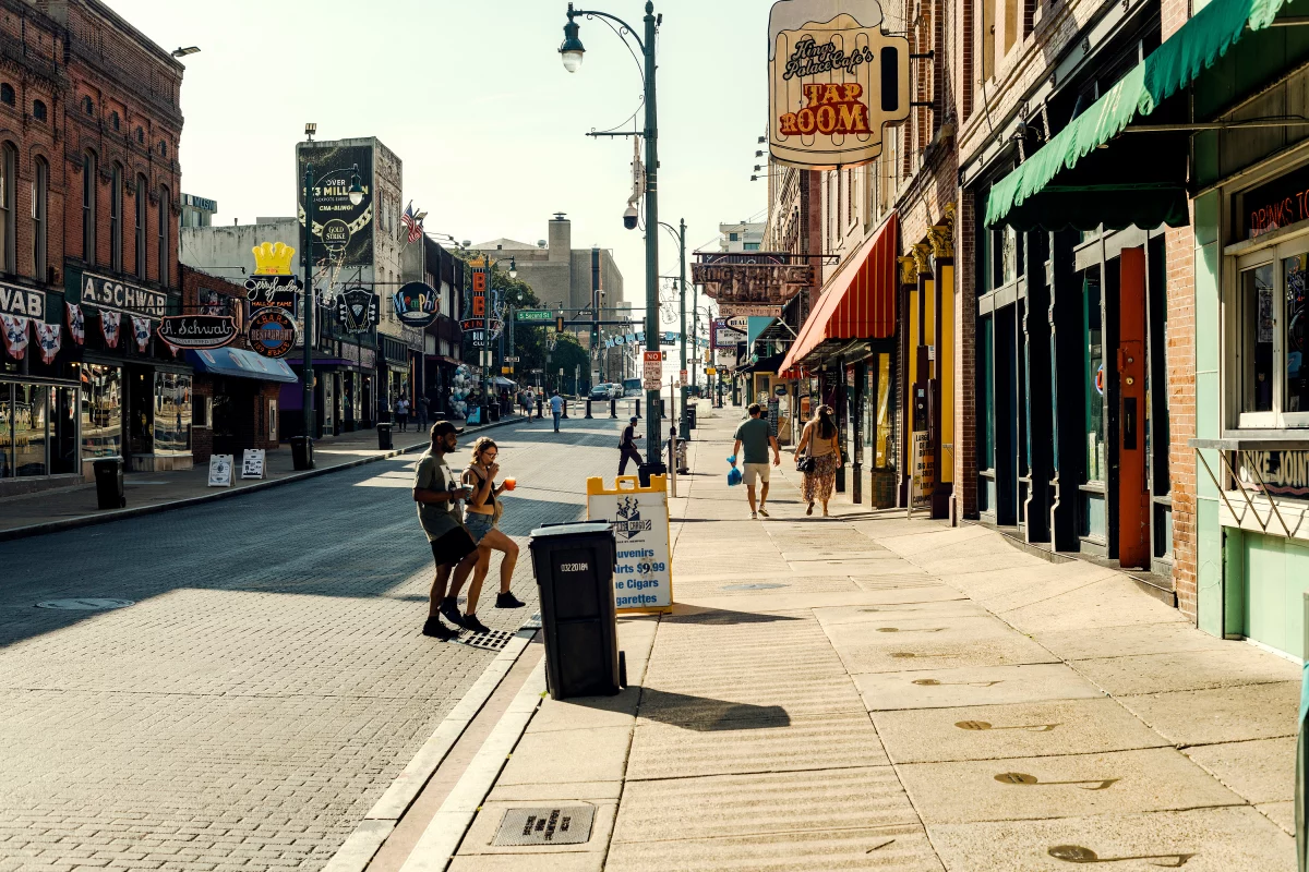 Pedestrians on Beale Street in downtown Memphis, Tennessee, US, on Tuesday, Sept. 16, 2025.