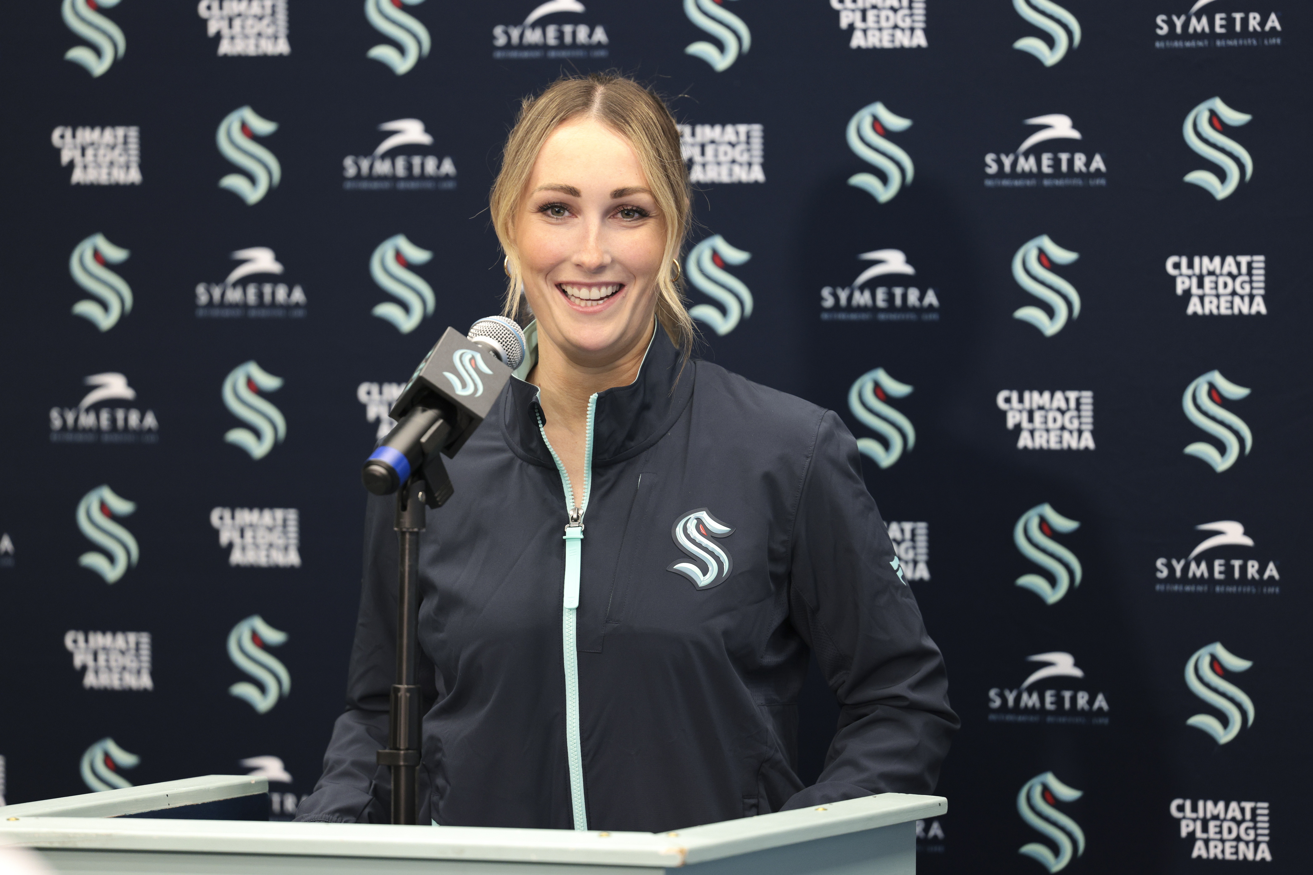 Seattle Kraken new assistant coach Jessica Campbell speaks during an NHL hockey press conference Wednesday in Seattle. Campbell will become the first woman to work on the bench of an NHL franchise after the team hired her as an assistant coach.