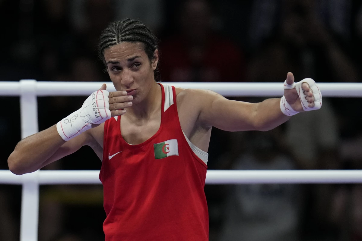 Algeria's Imane Khelif celebrates after defeating Hungary's Anna Hamori in their women's 66kg quarterfinal boxing match on Saturday.