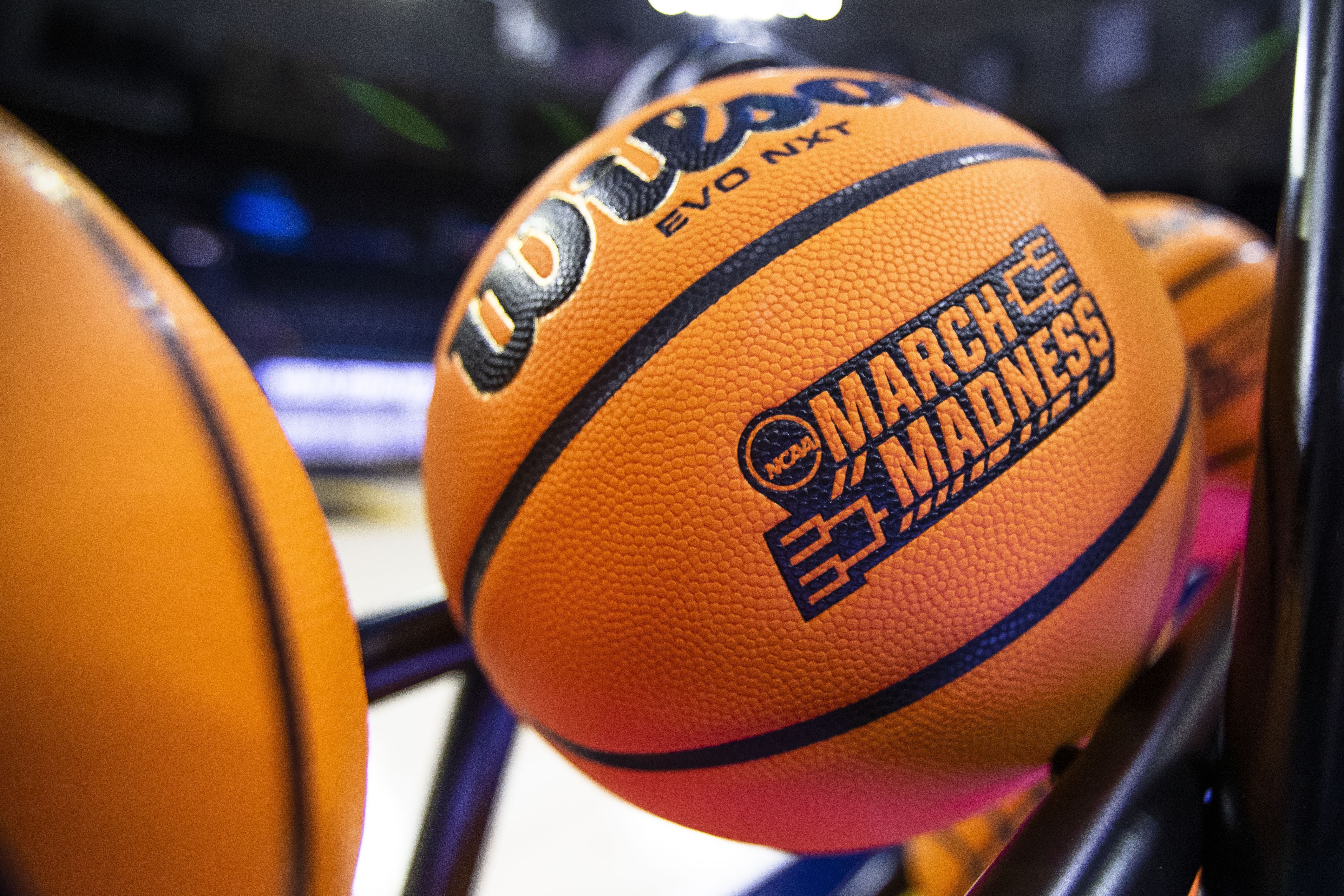 A basketball with a March Madness logo rests on a rack before a First Four game between Illinois and Mississippi State in the NCAA women's basketball tournament Wednesday, March 15, 2023, in South Bend, Ind. (AP)
