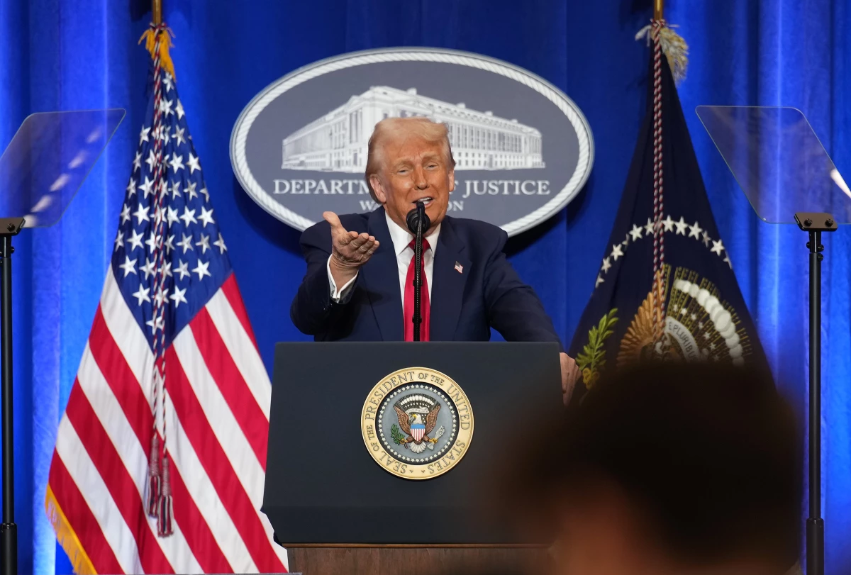 President Trump gestures while speaking at the Justice Department on March 14, 2025, in Washington, D.C.