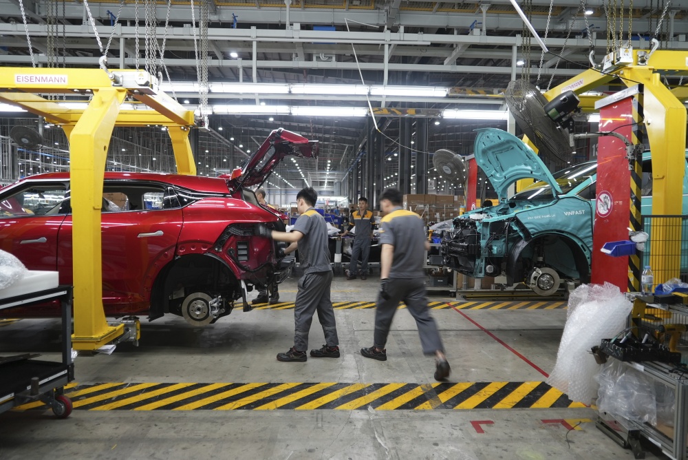 Workers assemble electric cars at a Vinfast factory in Hai Phong, Vietnam, on Sept. 29, 2023. (AP)