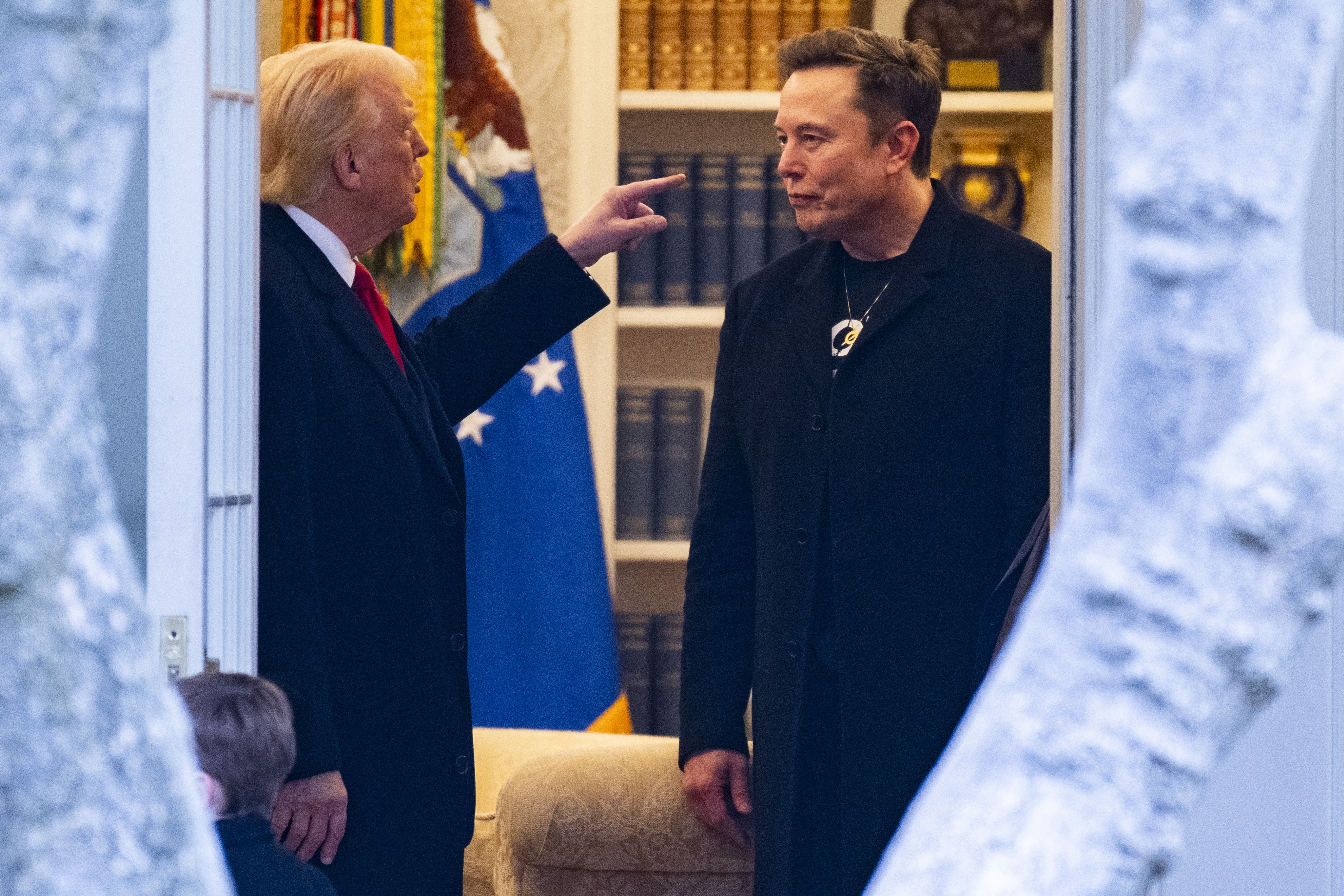 President Trump and his adviser Elon Musk speak before departing the White House on his way to his South Florida home in Mar-a-Lago in Florida on March 14, 2025.