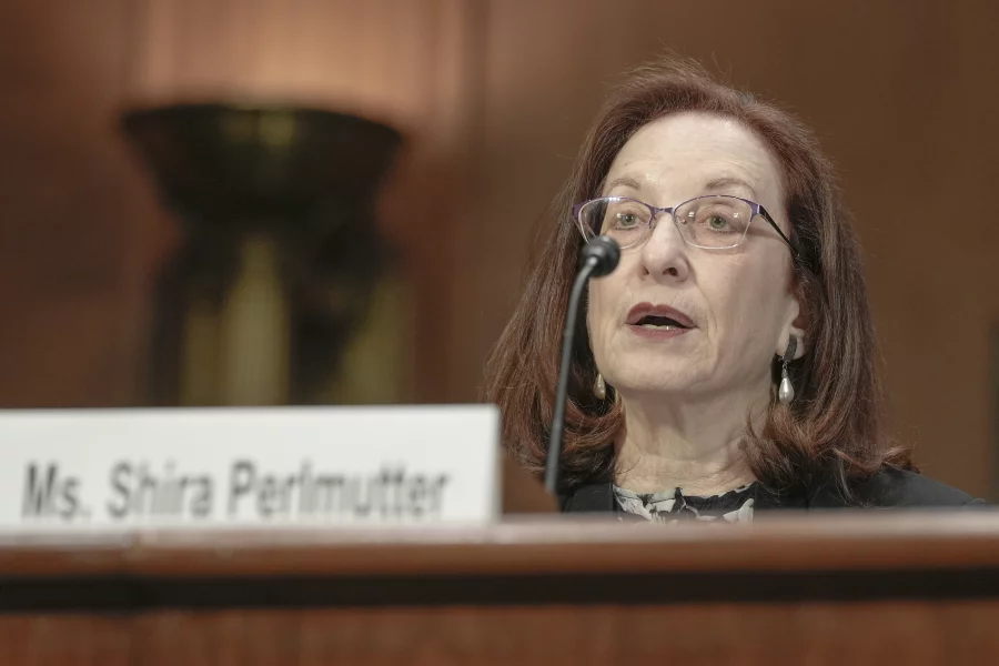 Shira Perlmutter speaking during a testimony in front of a panel, with a nameplate in front reading 'Ms. Shira Perlmutter'.
