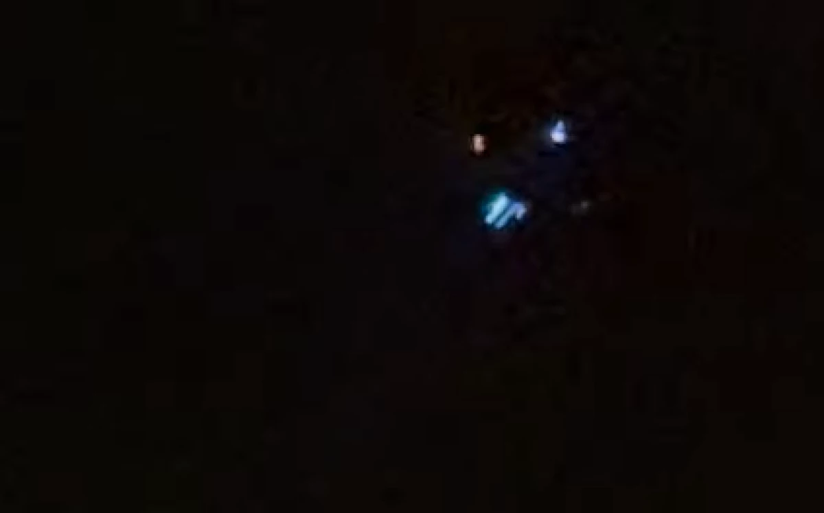 Residents across New Jersey have been trying to decipher who has been flying mysterious unidentified drones over the state, with some taking to Facebook to share videos of sightings. Above, a screengrab from video of a potential sighting shared on Facebook.