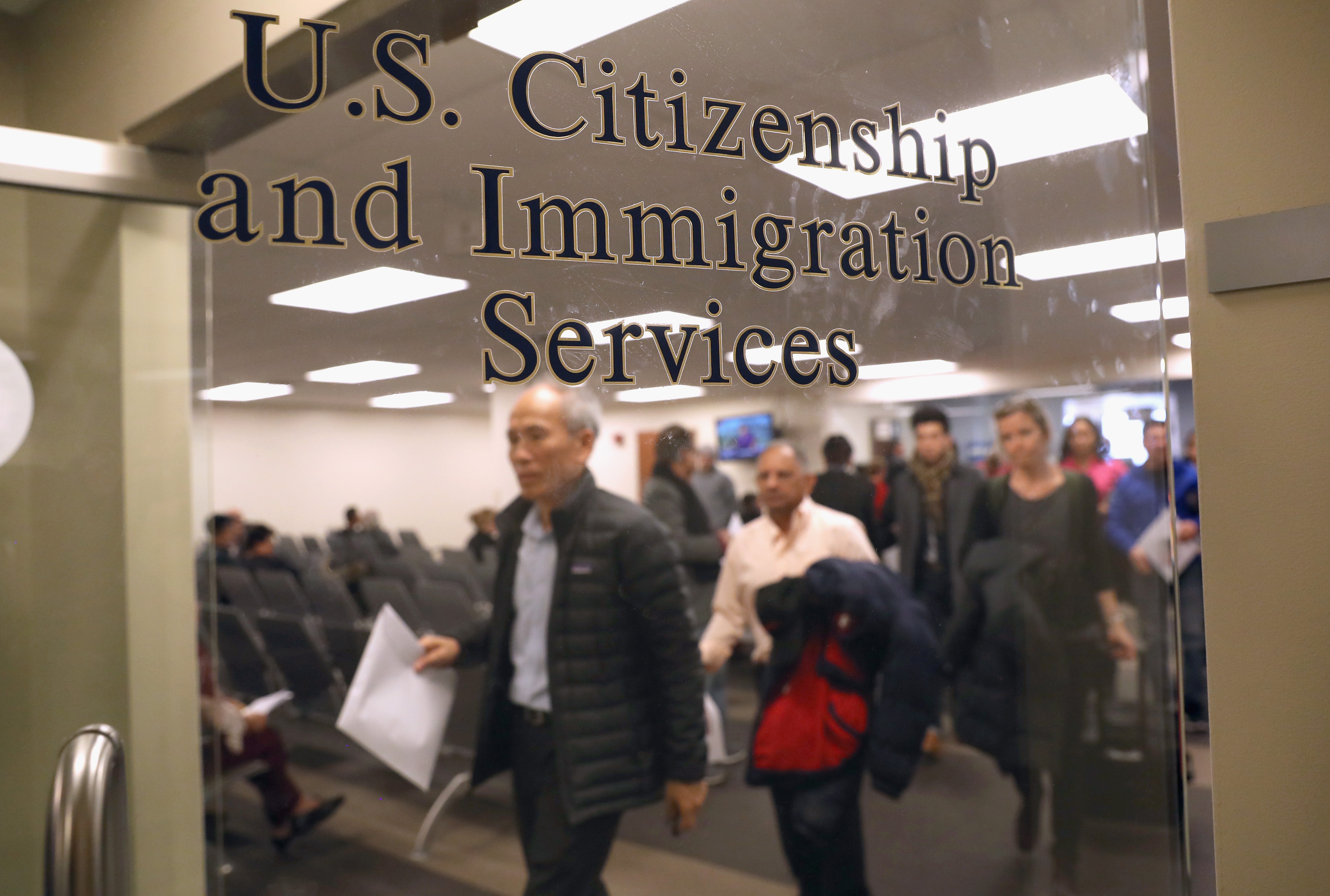 Immigrants prepare to become American citizens at a naturalization service on Jan. 22, 2018 in Newark, New Jersey. Although much of the federal government was shut down Monday morning, the U.S. Citizenship and Immigration Services (USCIS), offices remained open nationwide. (Getty Images North America)