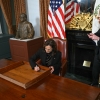 Vice President Harris signs the drawer of her desk as second gentleman Doug Emhoff takes a picture on Jan. 16, 2025.