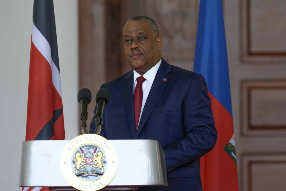 Haiti Prime Minister Garry Conille speaks during a joint press conference with Kenya's President William Ruto at the State House in Nairobi, Kenya, Oct. 11, 2024. (AP)