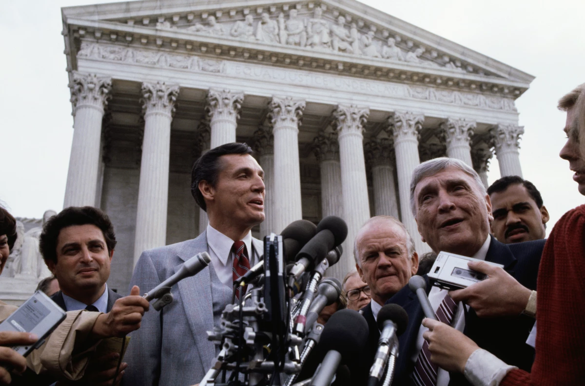 Bob Jones III, the president of Bob Jones University, speaks outside the U.S. Supreme Court in 1982. The IRS rescinded the university's tax-exempt status in the 1976.