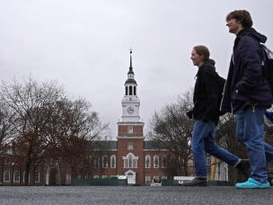 Students cross the campus of Dartmouth College in Hanover, N.H., in 2024.