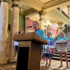 Rep. Mary Caferro, a Democrat in the Montana House, spoke at a rally in July at the Montana Capitol in Helena, criticizing the state’s expedited rollout of Medicaid work requirements. She’s among several Democrats who pushed for the state to delay implementing the rules until the Jan. 1 federal deadline.