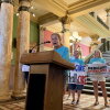 Rep. Mary Caferro, a Democrat in the Montana House, spoke at a rally in July at the Montana Capitol in Helena, criticizing the state’s expedited rollout of Medicaid work requirements. She’s among several Democrats who pushed for the state to delay implementing the rules until the Jan. 1 federal deadline.