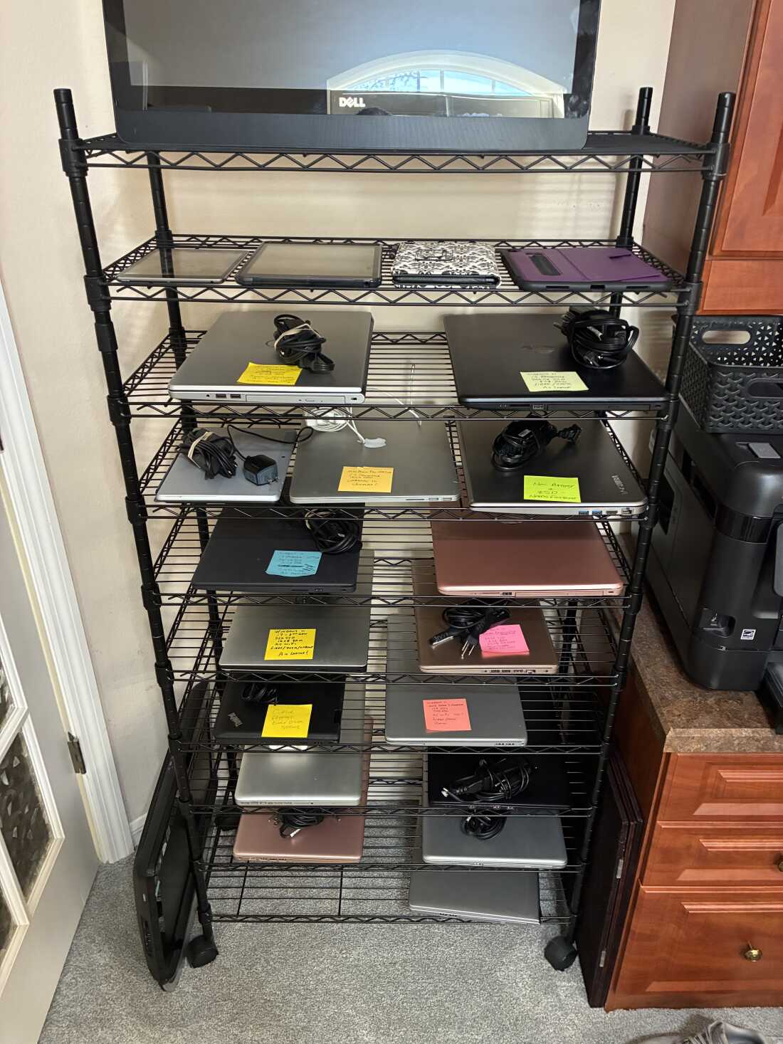 Craig Clark is a one man operation. His office has racks with computers that need to be refurbished and others ready to be donated.