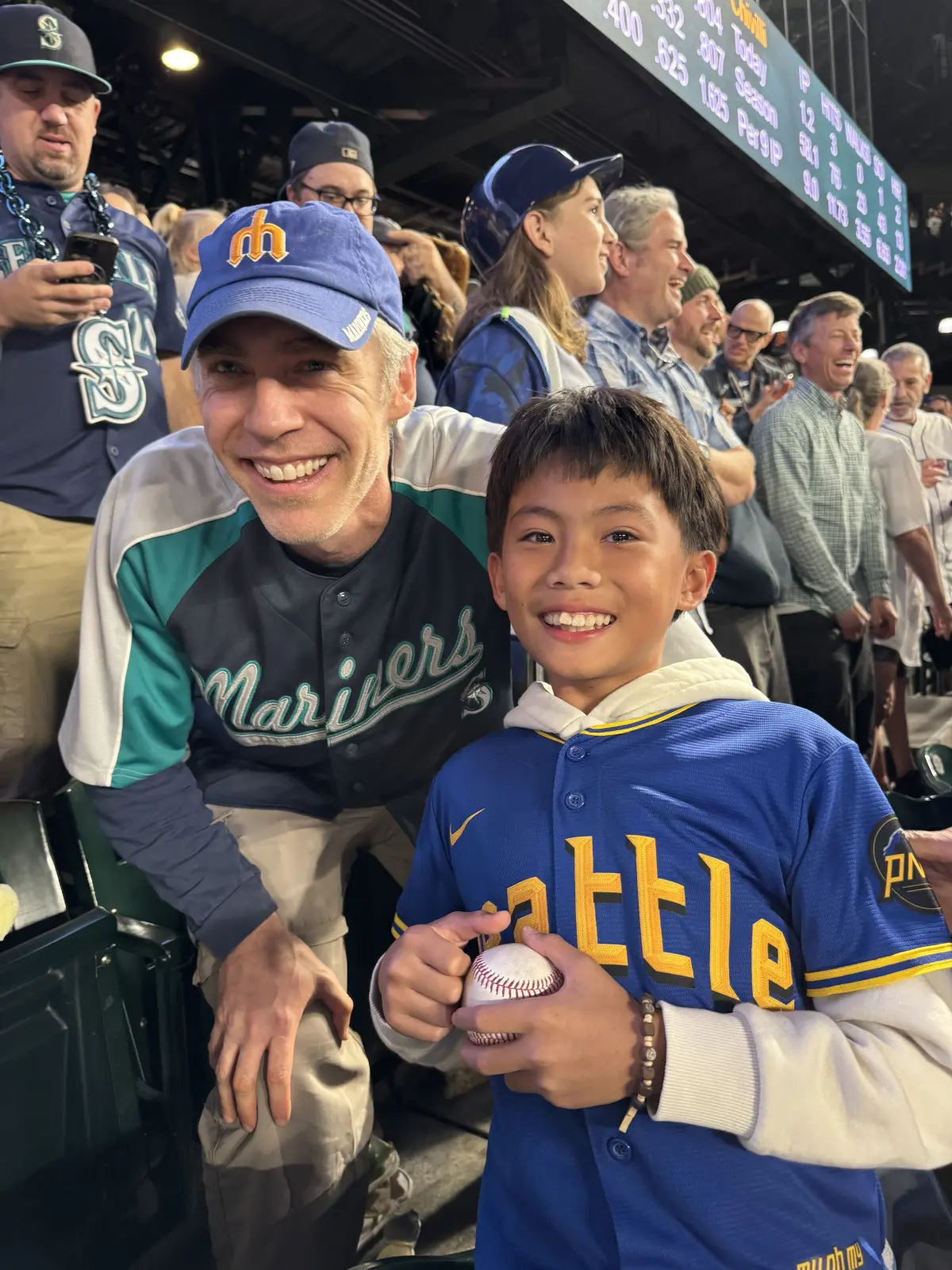 Random act of kindness: Mariners fan gifts historic ball to young ...