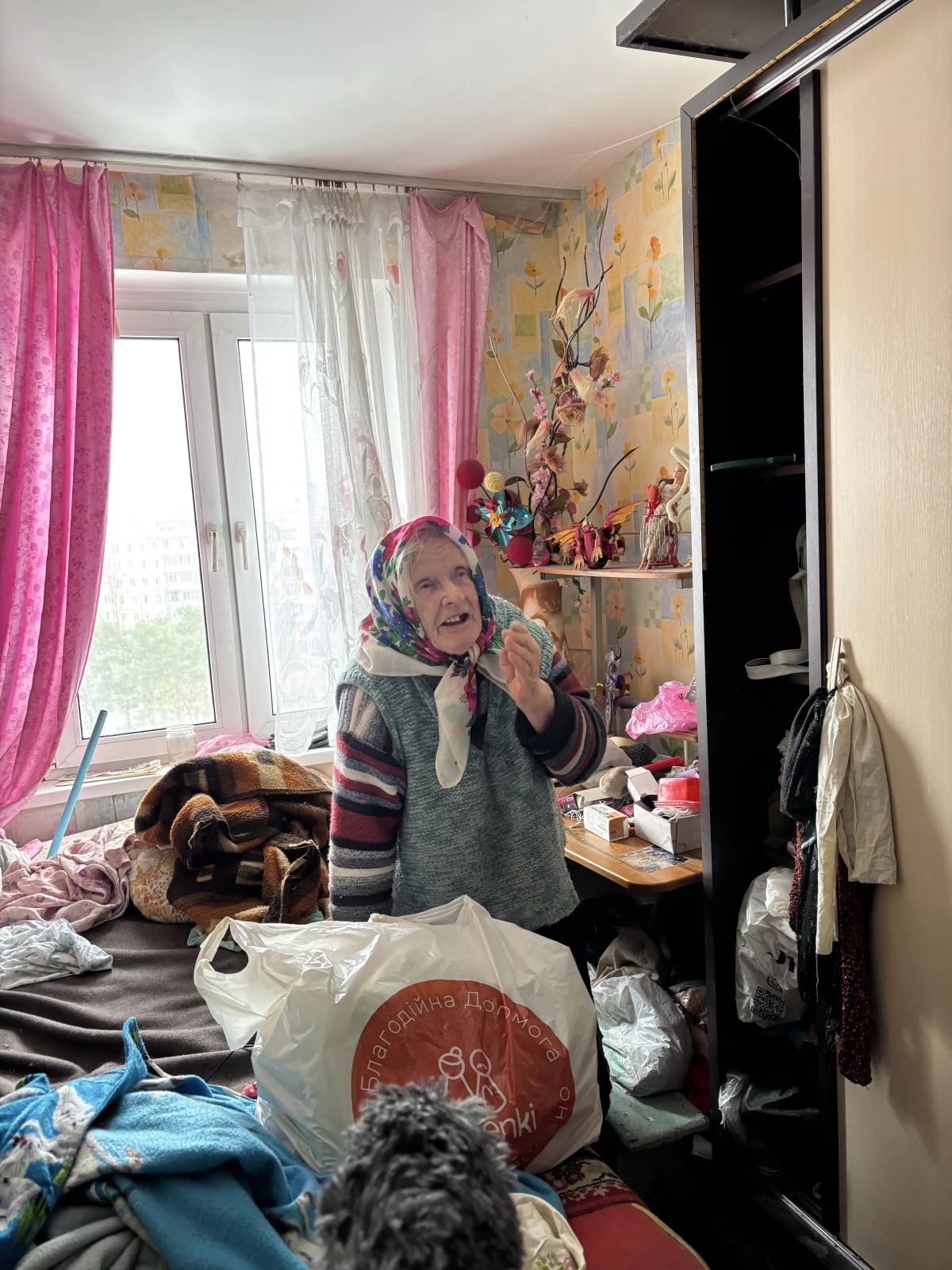 Liliya Martynivna Lapina, 88, lives on the 10th floor of her building and must use the stairs when power cuts disable the elevator.