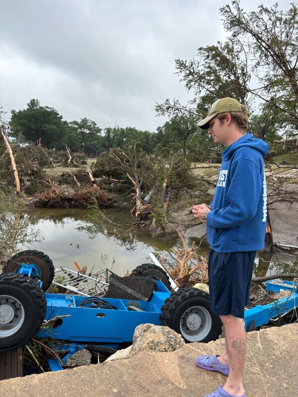 Ryan Dale observes the destruction at the Louis Hays Park in Kerrville, Texas on July 5, 2025.