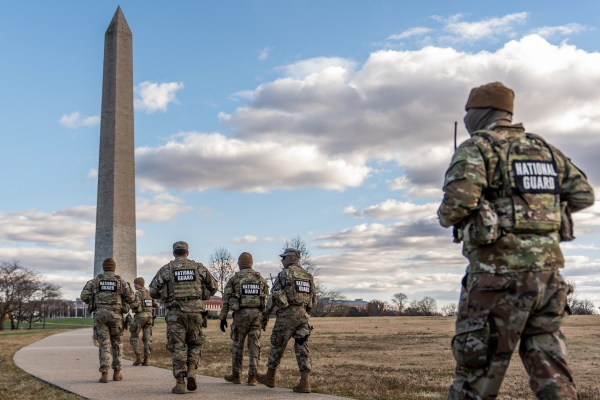 National Guardsmen patrol in front of the Washington Monument on the National Mall on Friday.