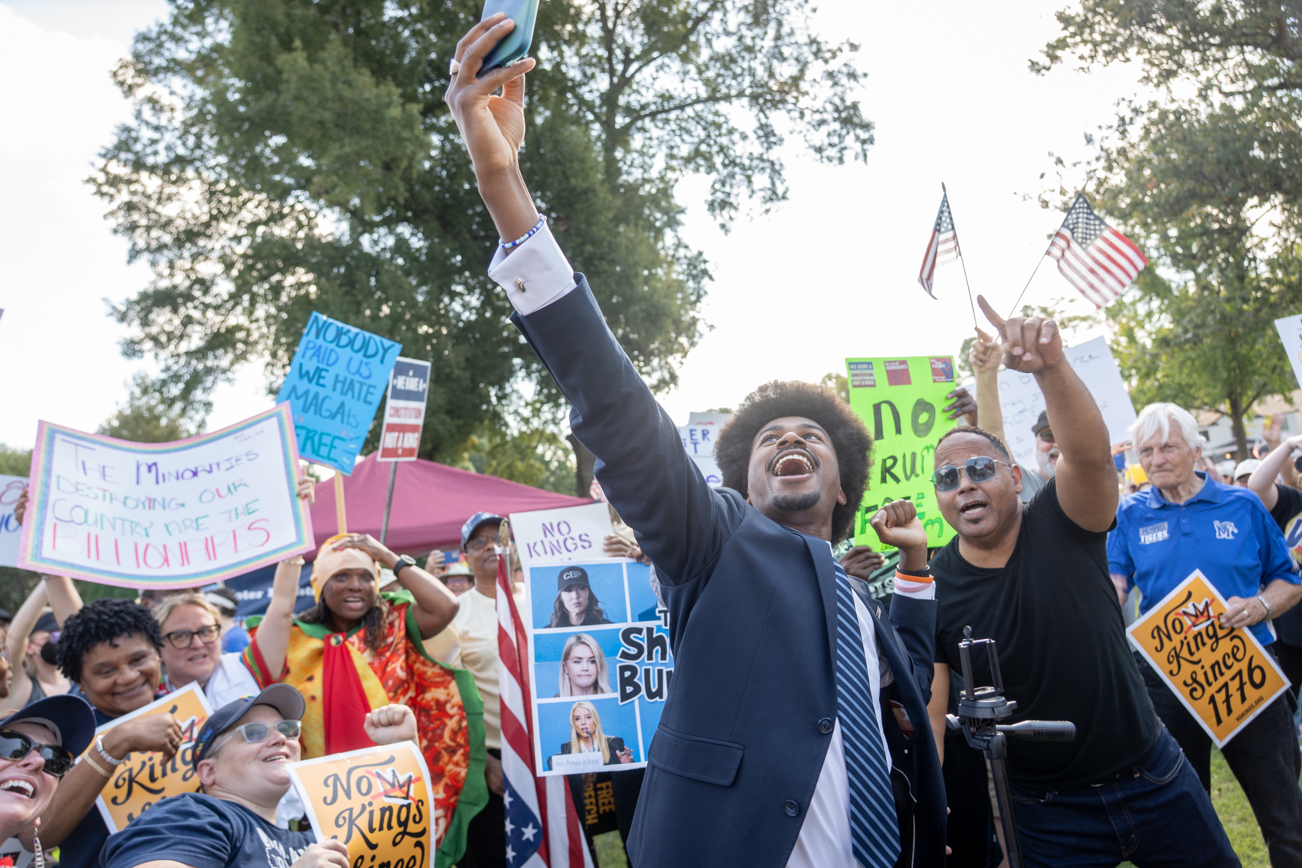 Tennessee State Representative Justin Pearson takes a selfie with protesters at a "No Kings" protest on October 18, 2025 in Memphis, Tenn. Pearson is looking to unseat his former boss, Rep. Steve Cohen.