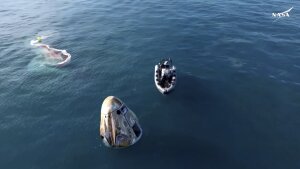 In this image taken from video provided by NASA, a SpaceX capsule floats in the Gulf of Mexico, Tuesday, March 18, 2025, after landing off the coast of Florida with NASA astronauts Suni Williams, Butch Wilmore and Nick Hague, and Russian cosmonaut Alexander Gorbunov.