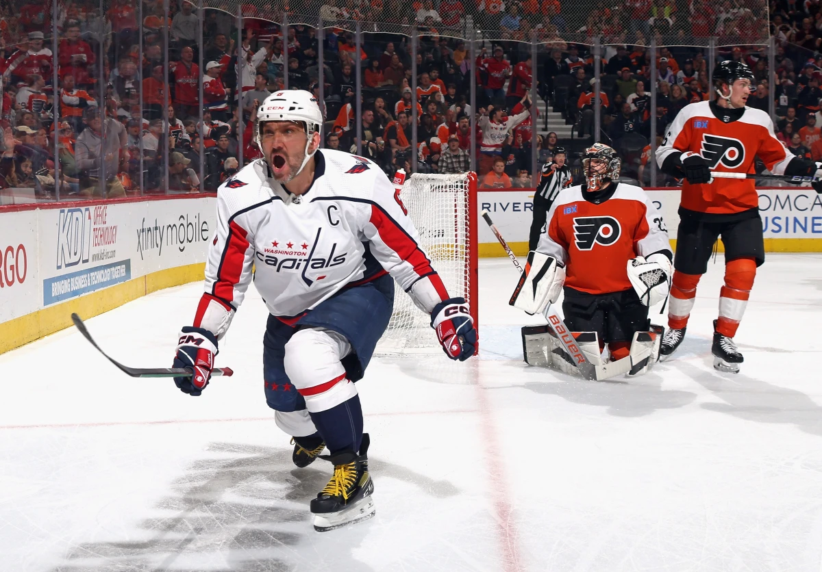 Alex Ovechkin of the Washington Capitals celebrates after scoring against the Philadelphia Flyers on April 16, 2024, in Philadelphia. He's now in his 20th season in the NHL.