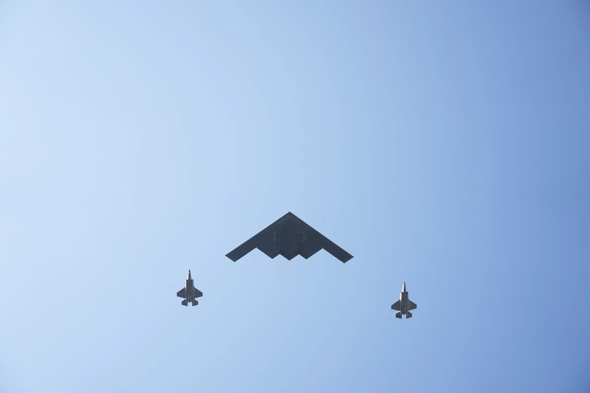 A nuclear-capable B-2 Spirit bomber flies over the White House on July 4, 2025 in Washington, DC. Nuclear arms control experts don't believe the expiration of the New START treaty will immediately lead to a new arms race, though that dynamic could change over time.