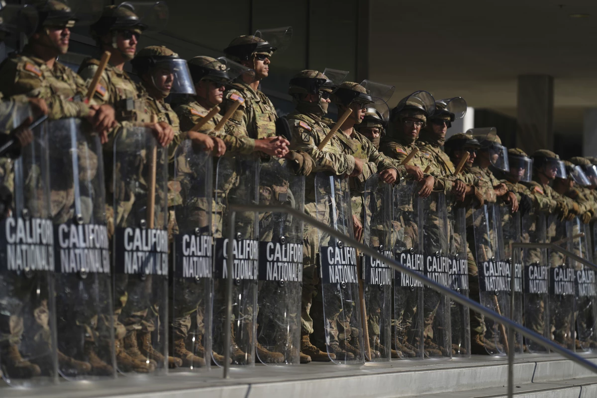 FILE - California National Guard are positioned at the Federal Building, June 10, 2025, in downtown Los Angeles.
